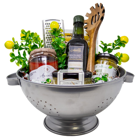 Pasta Night Gift Basket with pasta, sauce, olive oil, and kitchen essentials in a woven basket